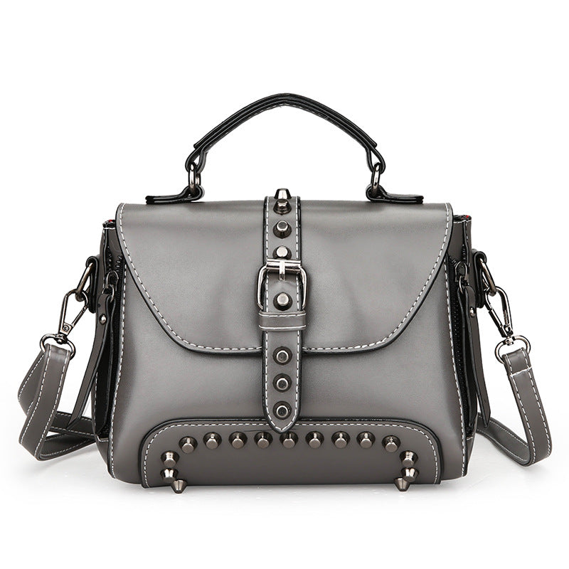 Retro oil leather rivet handbags